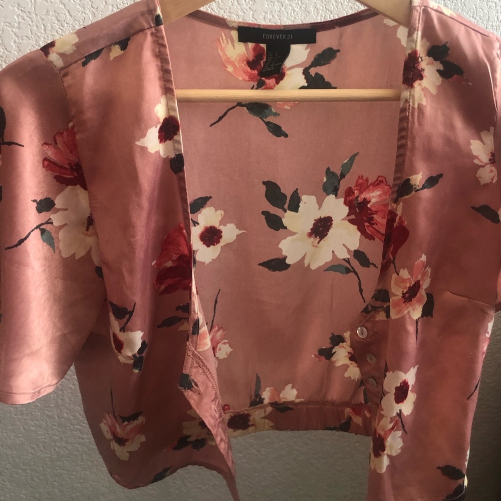 A pink floral crop top only worn once